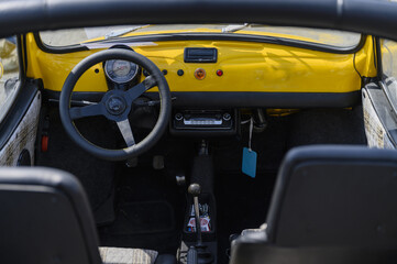 Obraz na płótnie Canvas Round steering wheel from a veteran car.