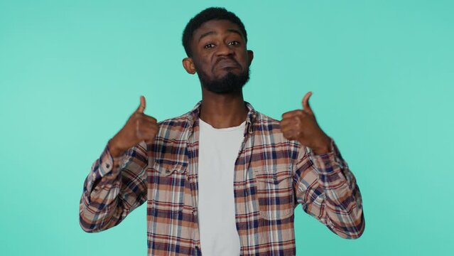 I am the best, choose me. African american man feeling very proud pointing himself looking self-confident overjoyed by success. Young guy on blue studio background. People sincere emotions lifestyle