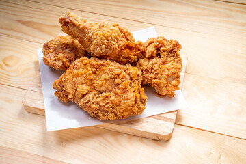 Fried chicken Crispy Chicken on wooden background.  