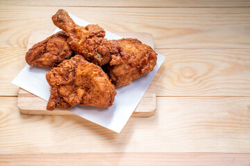 Fried chicken Soft Chicken on wooden background.