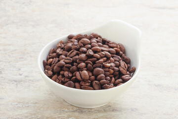 Roasted coffee bean in the bowl