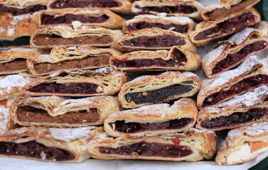 Heap of delicoius strudel stuffed with poppy apfel and cherry