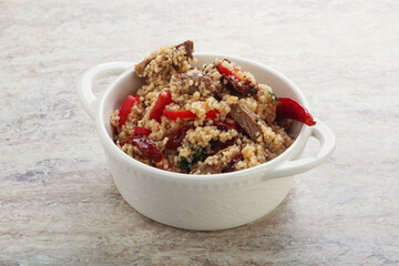 Arabic cous cous with meat and tomato