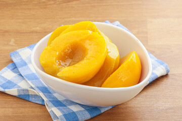 Sweet canned peaches with syrope