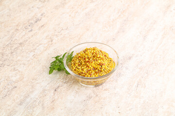 Grain mustard sauce in the bowl