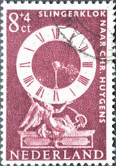 Netherlands - circa 1962: a postage stamp from the Netherlands , showing a historic Pendulum clock
