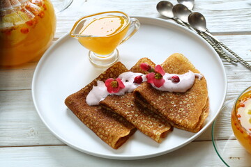 Pancakes with sea buckthorn tea