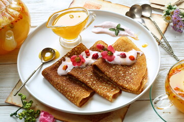 Pancakes with sea buckthorn tea