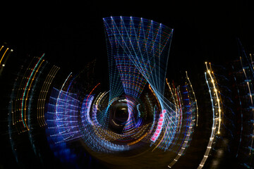 Rotational movement of bright abstract light and colour with triangle shapes