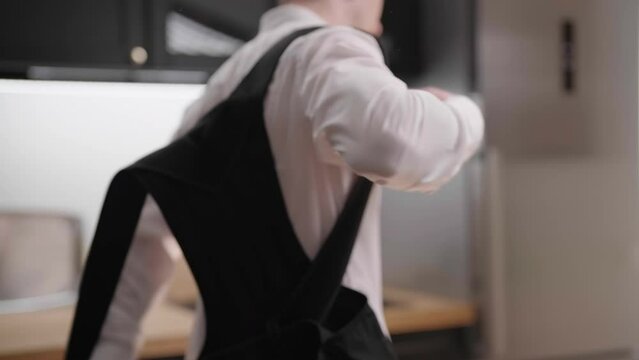 Headless male person in white collar shirt put on posture belt 4K