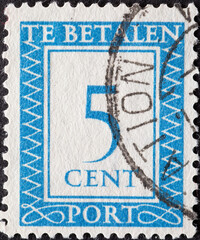 Netherlands - circa 1948: a postage stamp from the Netherlands , showing a number with an...