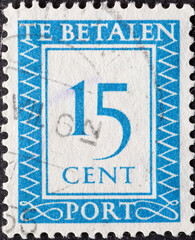 Netherlands - circa 1947: a postage stamp from the Netherlands , showing a number with an...