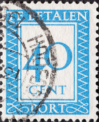 Netherlands - circa 1947: a postage stamp from the Netherlands , showing a number with an...