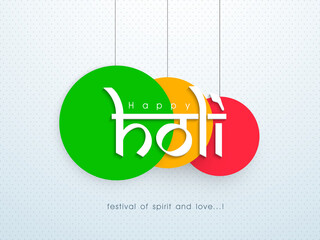 Happy Holi Font With Tricolor Round Tag Or Label Hang On Pastel Blue Dotted Background.