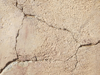 Cracked hard concrete surface