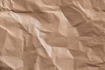 Brown crumpled gift wrapping paper, texture, background.