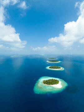 Aerial view of tropical islands in Baa Atoll, Maldives