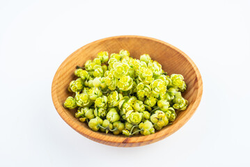Dish of essential oil spice sagebrush flower on white background