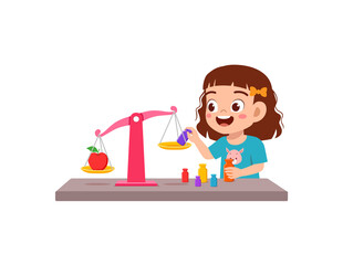 little girl study about weighing scale to balance object