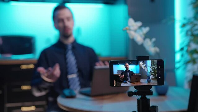 Smartphone video recording businessman influencer in shirt make coach content education 4K