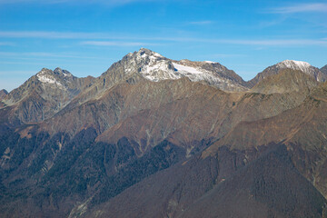 Fototapeta premium Beautiful mountain landscapes with peaks and valleys against a clear blue sky