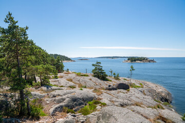 Fototapeta na wymiar The rocky view of Porkkalanniemi and view to the Gulf of Finland and island on the background, Finland