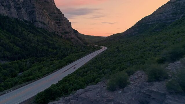 Aerial view of traffic in Provo Canyon at sunset looking down the highway.