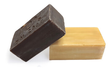 Coal tar and laundry soap isolated on a white background