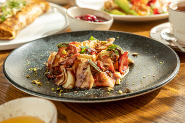 traditional Russian pastries: pancakes for Maslenitsa, pancakes with salmon, pancakes with honey, pancakes for breakfast