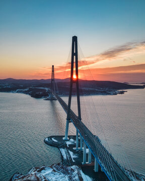 Winter aerial view of sunset over famous cable-stayed bridge from Vladivostok to Russky Island, Far East of Russia