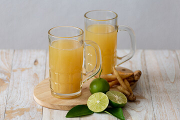 Kaempfer juice on a wooden table
