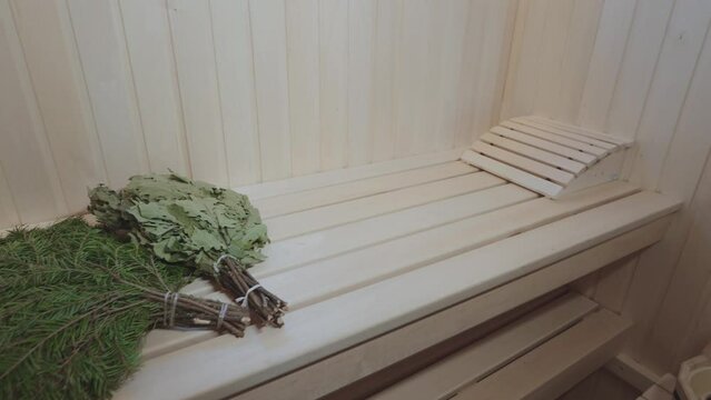 Wooden bath. Steam room in a traditional sauna.