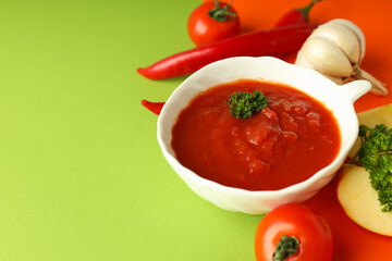 Concept of tasty food with adjika, space for text