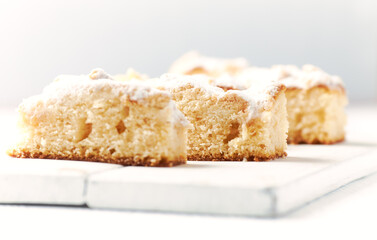 Simple yeast cake on bright background. Close up.	
