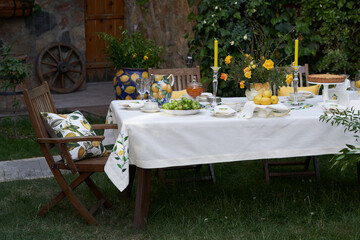 Table with apple pie, fruits snacks. Spring concept