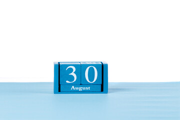 Wooden calendar August 30 on a white background