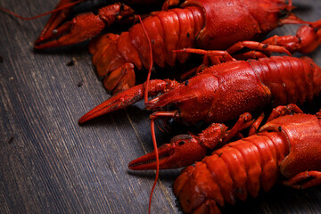 delicacy for beer, boiled red crayfish with lemon and bay leaves