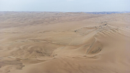 Fototapeta na wymiar Aerial view of the dunes in the Ica desert