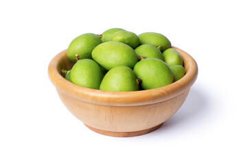 Mangifera mango in wooden bowl isolated on white background with clipping path.