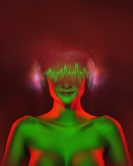 Beautiful sexy woman listens music in headphones around colourful neon. Creative cosmos concept