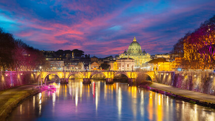 Fototapeta na wymiar Rome, Italy. Cityscape image of Rome, Italy with the Holy Angel Bridge (Ponte Sant Angelo) and the St. Peter's Basilica at twilight blue hour.