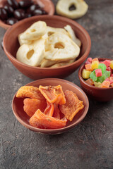 Dried Sweet Fruits on a dark background