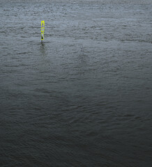 a street sign in the water due to flood