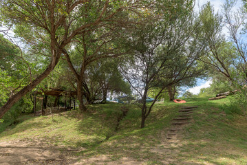 Fototapeta premium Camping site next to Modder River at River of Joy