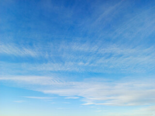 Cirrus and altostratus clouds in the blue sky. Colorful sky background - obrazy, fototapety, plakaty