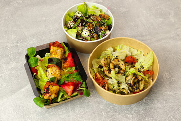 Lunch boxes with food ready for work or school, pre-cooking or diet. Healthy food delivery service and daily ration concept.