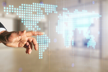 Man hand clicks on abstract creative digital world map on blurred office background, globalization concept. Multiexposure