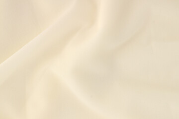 Smooth elegant creamy white silk or elegant satin texture can be used as background, elegant wedding background design.