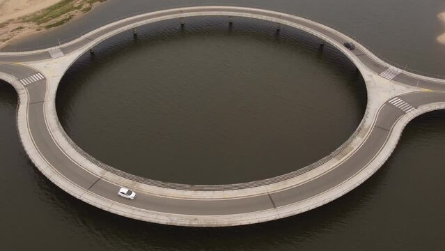 Pan over the Laguna Garzon Circular bridge in Uruguay