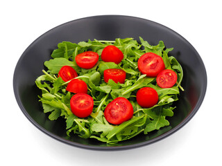 Green Arugula salad with red tomatoes isolated on white background